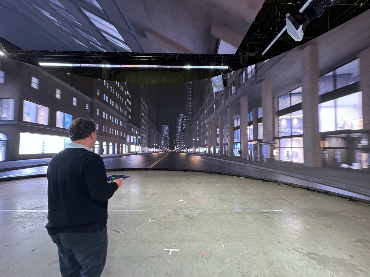 4Wall operator inside the LED car process volume displaying a city scene